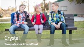  Presentation with kids in school - PPT theme enhanced with k - young school kids sitting background and a mint green colored foreground