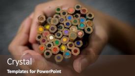  Presentation with hand holding pencil - Slide deck with kid holding pencil colors in hand background and a tawny brown colored foreground