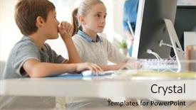  Presentation with desktop - PPT theme featuring kids in computer lab working background and a mint green colored foreground