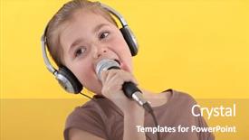  Presentation with headphones asia - Presentation theme featuring kids singing - little girl with microphone background and a violet colored foreground