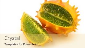  Presentation with melon - Audience pleasing theme consisting of kiwano melon cucumis metuliferus african horned melon and a cut piece on a white background backdrop and a yellow colored foreground
