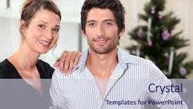  Presentation with animated christmas tree - PPT theme featuring klaus - couple behind a christmas tree background and a  colored foreground
