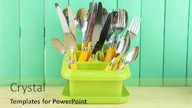  Presentation with plastic container - Cool new theme with knives spoons forks in plastic container for drying on color wooden background backdrop and a yellow colored foreground