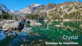  Presentation with snow mountain - Amazing PPT theme having lake-haiyaha-with-rocks backdrop and a ocean colored foreground