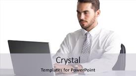  Presentation with cheerful stylish city girl using - Slides with laptop at desk on white background and a light gray colored foreground