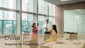  Presentation with employees - Slide set enhanced with laptop laguage - three indian employees talking background and a coral colored foreground