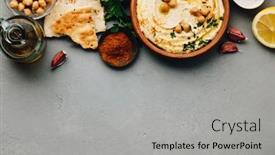  Presentation with olive oil - Presentation having large-bowl-of-homemade-hummus background and a light gray colored foreground