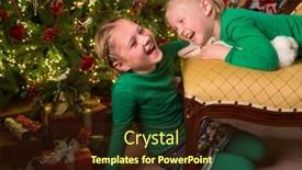  Presentation with christmas presents - Amazing PPT theme having laughing little sisters near their christmas tree and presents backdrop and a wine colored foreground