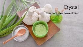  Presentation with oil products - Cool new PPT layouts with laundry care products - spa setting with aloe vera backdrop and a light gray colored foreground