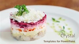  Presentation with carrots - Audience pleasing presentation design consisting of layered salad with herring beets carrots onions potatoes and eggs close-up on a plate backdrop and a soft green colored foreground