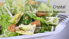  Presentation with salad - PPT theme consisting of caesar salad with cheese and croutons background and a mint green colored foreground