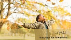  Presentation with drop - Colorful slide set enhanced with leaves drop onto a little boy with outstretched arms on an autumns day backdrop and a yellow colored foreground