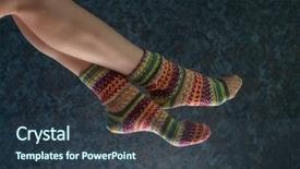  Presentation with knitting needles and wool - Presentation theme with legs in wool knitted sock background and a tawny brown colored foreground