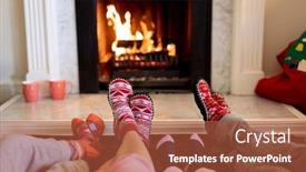  Presentation with christmas fireplace log fire burns - Slide deck consisting of legs of a caucasian family lying on the floor a couple with their young son and daughter warming their feet together in front of a fireplace in their sitting room at christmas time background and a red colored foreground