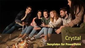  Presentation with camp - Cool new theme with leisure and people concept - group of smiling friends sitting at camp fire with tablet pc computer on beach at night backdrop and a tawny brown colored foreground