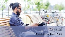  Presentation with man sitting bench - PPT theme having leisure technology communication travel and people concept - man with tablet pc computer and bag sitting on city street bench background and a teal colored foreground