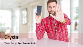  Presentation with plasma screen - Presentation featuring les danger de la maison - handsome man showing smartphone screen background and a  colored foreground