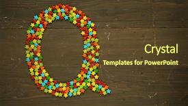  Presentation with candy - Beautiful presentation design featuring letter q from alphabet made backdrop and a tawny brown colored foreground