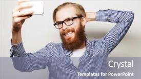  Presentation with man holding phone - Theme consisting of life style concept a young man with a beard in shirt holding mobile phone and making photo of himself while standing against grey background background and a gray colored foreground