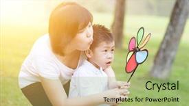  Presentation with flare - Audience pleasing slide set consisting of lifestyle portrait of asian mother and son playing windmill in the park family outdoor fun morning with sun flare backdrop and a mint green colored foreground