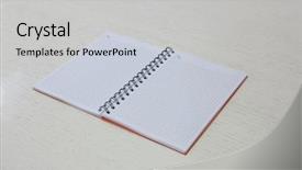  Presentation with notebook - PPT theme having line graph math - squared notebook lying on table background and a light gray colored foreground