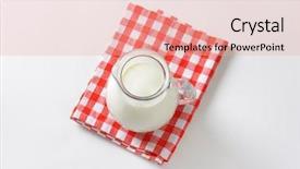  Presentation with cow milk - Audience pleasing PPT theme consisting of literview - overhead view of glass pitcher backdrop and a coral colored foreground