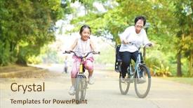  Presentation with bicycle - Colorful PPT theme enhanced with chinese children - little asian girl and grandmother backdrop and a soft green colored foreground