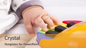  Presentation with baby toy - Presentation theme having little baby hand pianist plays background and a gold colored foreground