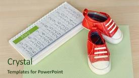  Presentation with baby shoes - Audience pleasing presentation consisting of little baby shoes with calendar backdrop and a mint green colored foreground