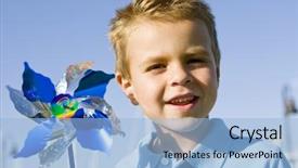  Presentation with pinwheel - Cool new PPT theme with wind energy close up portrait - little boy blowing backdrop and a light blue colored foreground