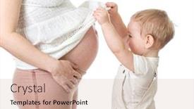  Presentation with pregnant mother - Presentation theme having little boy looking on pregnant mother's belly isolated studio shot background and a soft green colored foreground