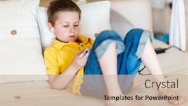  Presentation with mobile games - Presentation theme featuring little boy playing video games on portable console or mobile phone background and a soft green colored foreground