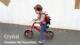  Presentation with pavement - Audience pleasing presentation design consisting of little-boy-rides-his-red backdrop and a gray colored foreground