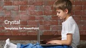  Presentation with laptop and wall - Audience pleasing PPT theme consisting of little boy using laptop on fur carpet against brick wall background backdrop and a tawny brown colored foreground