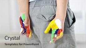  Presentation with colorful finger painted hands - Audience pleasing PPT theme consisting of little boy with hands painted backdrop and a light gray colored foreground