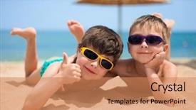  Presentation with wind energy close up portrait - Theme featuring little boys on the beach background and a coral colored foreground