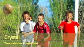  Presentation with sports field - Presentation theme featuring little boys playing soccer background and a tawny brown colored foreground