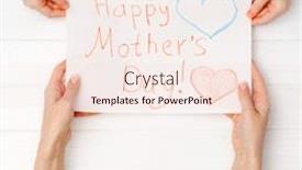  Presentation with postcard - Presentation with little child's hand giving a hand painted postcard to her mother's hand top view for happy mothers day background and a lemonade colored foreground