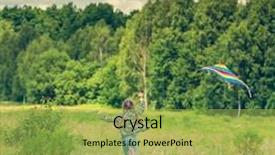  Presentation with kite - Theme enhanced with little cute girl flying a kite in a meadow on a sunny day back view background and a yellow colored foreground