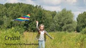  Presentation with kite - Audience pleasing PPT theme consisting of little cute girl flying a kite in a meadow on a sunny day backdrop and a gold colored foreground