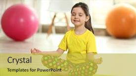  Presentation with yoga kids - PPT theme having little cute girl practicing yoga background and a yellow colored foreground