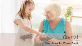  Presentation with teaching - Audience pleasing presentation consisting of little-girl-teaching-elderly-woman backdrop and a coral colored foreground
