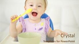  Presentation with happy baby - Slide deck having little happy baby with spoon background and a soft green colored foreground