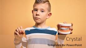  Presentation with orthodontic - Cool new PPT layouts with little-kid-boy-holding-professional backdrop and a coral colored foreground
