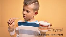  Presentation with orthodontic - Slide deck with little-kid-boy-holding-professional background and a coral colored foreground