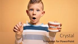  Presentation with orthodontic - PPT theme consisting of little-kid-boy-holding-professional background and a coral colored foreground