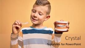  Presentation with orthodontic - Slide set featuring little-kid-boy-holding-professional background and a coral colored foreground
