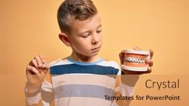  Presentation with orthodontic - Slides having little-kid-boy-holding-professional background and a coral colored foreground