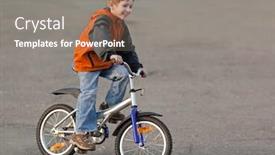  Presentation with cycling - Presentation theme having little smiling child boy cycling sport bicycle outdoor background and a gray colored foreground