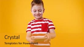  Presentation with internet surfing - Colorful PPT theme enhanced with little smiling child boy playing games or surfing internet on digital smartphone isolated over orange background backdrop and a gold colored foreground